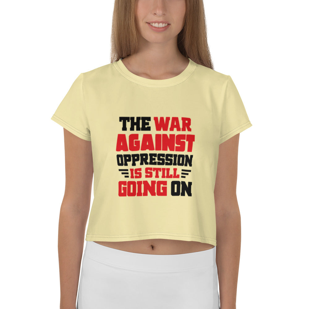 THE WAR AGAINST OPPRESSION IS STILL GOING ON - All-Over Print Crop Tee