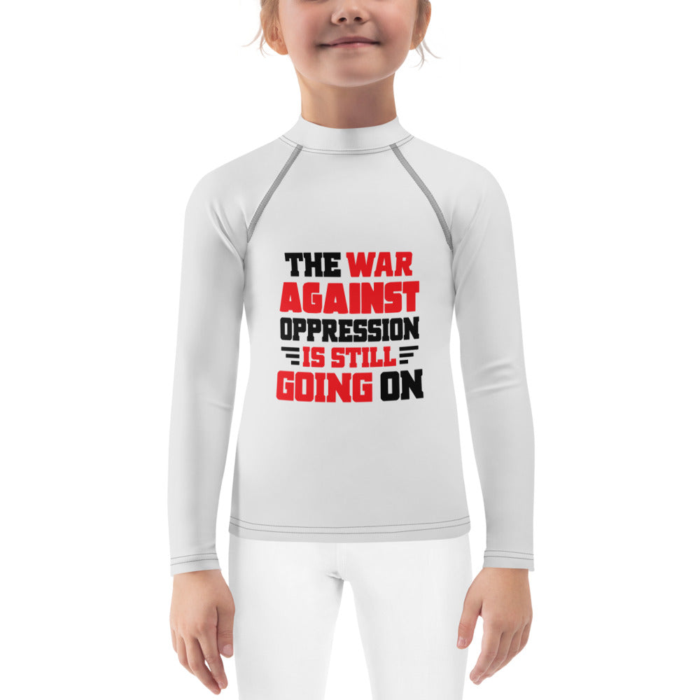 THE WAR AGAINST OPPRESSION IS STILL GOING ON - Kids Rash Guard