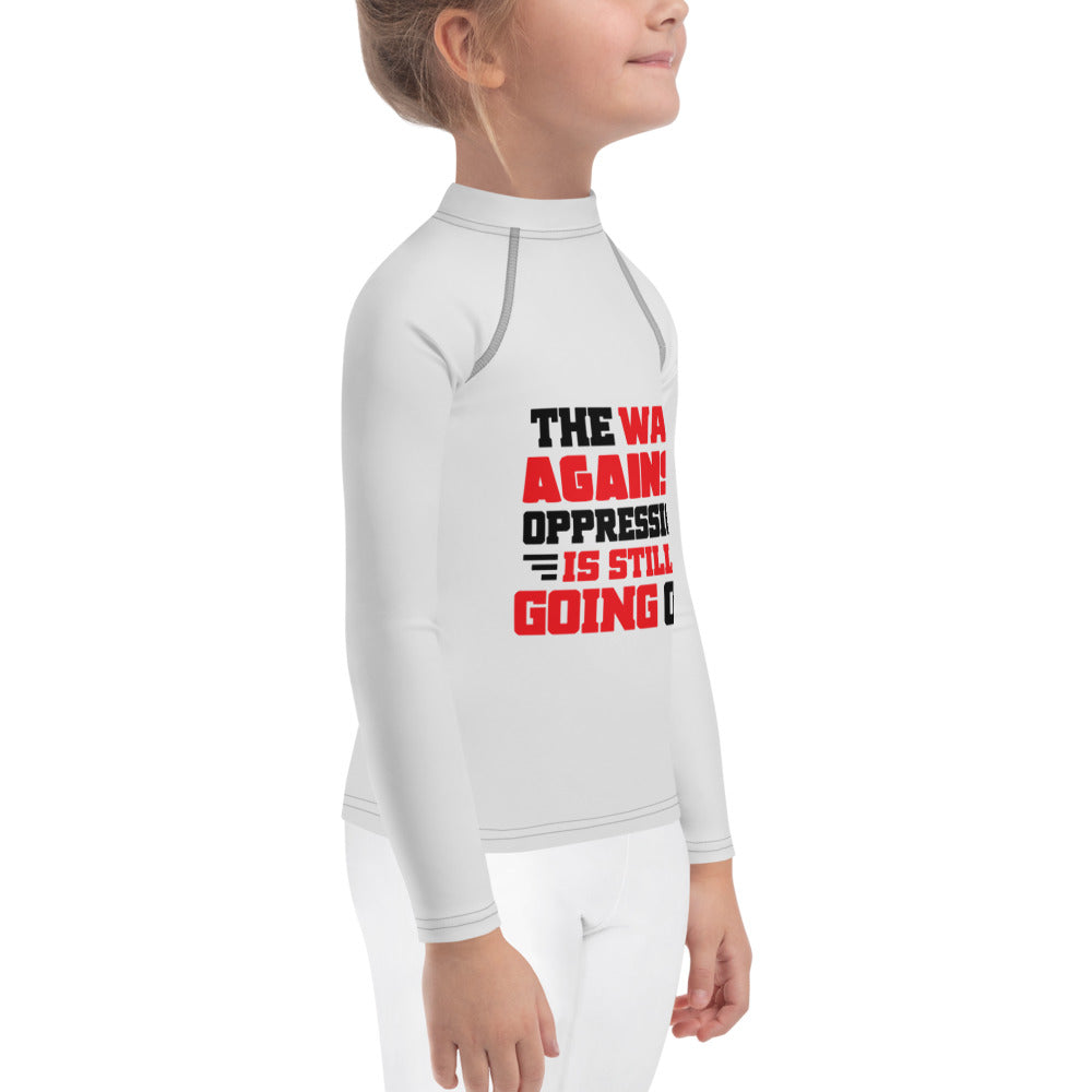 THE WAR AGAINST OPPRESSION IS STILL GOING ON - Kids Rash Guard