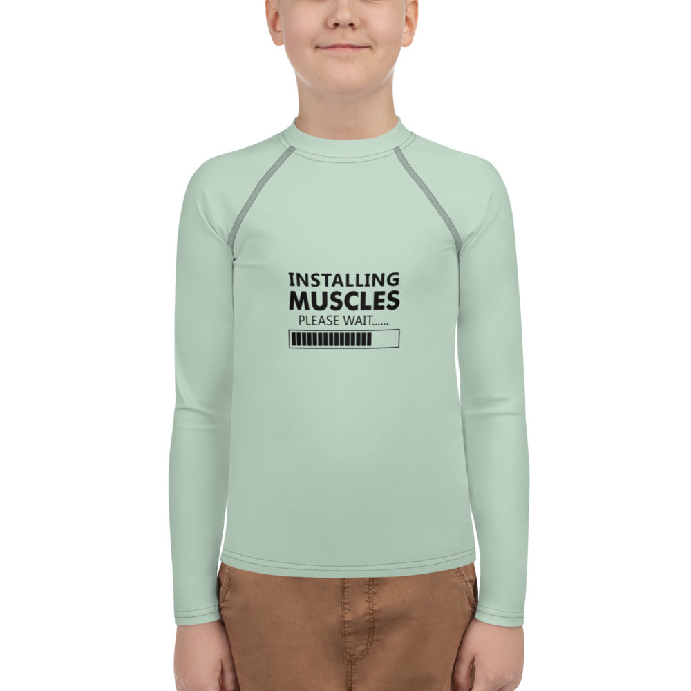 INSTALLING MUSCLES - Youth Rash Guard