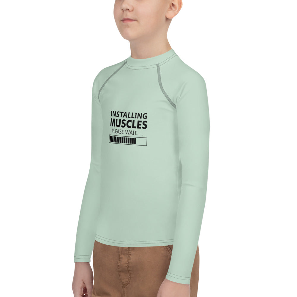 INSTALLING MUSCLES - Youth Rash Guard