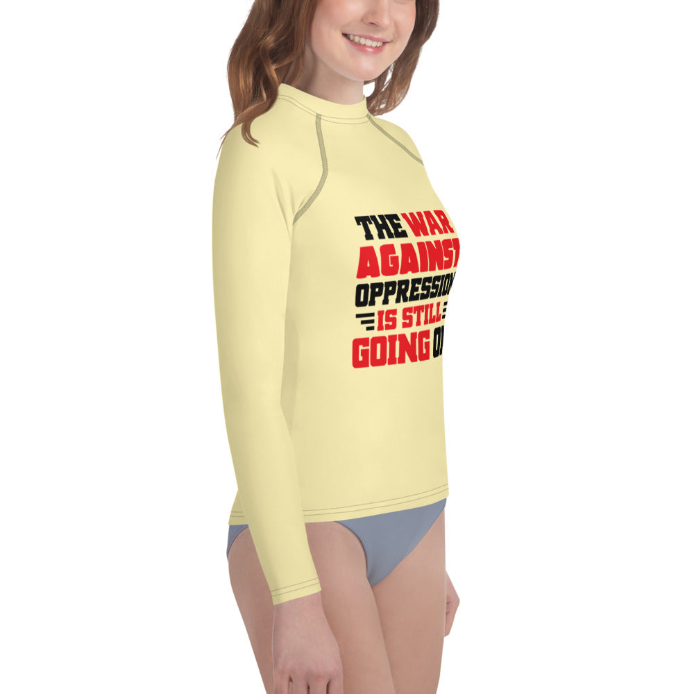 THE WAR AGAINST OPPRESSION IS STILL GOING ON - Youth Rash Guard